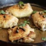 sous vide chicken piccata in a cast iron skillet