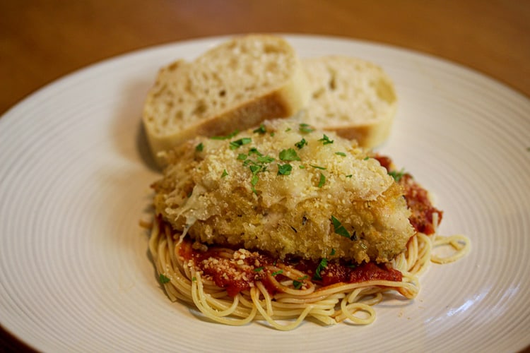 sous vide chicken parmesan with tomato sauce and pasta