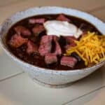 sous vide tri tip chili with sour cream and cheese