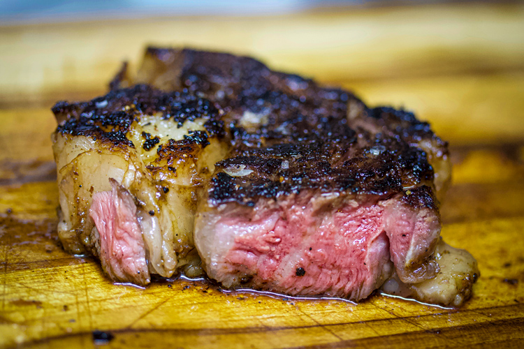 sous vide ribeye steak medium rare marbling with salt
