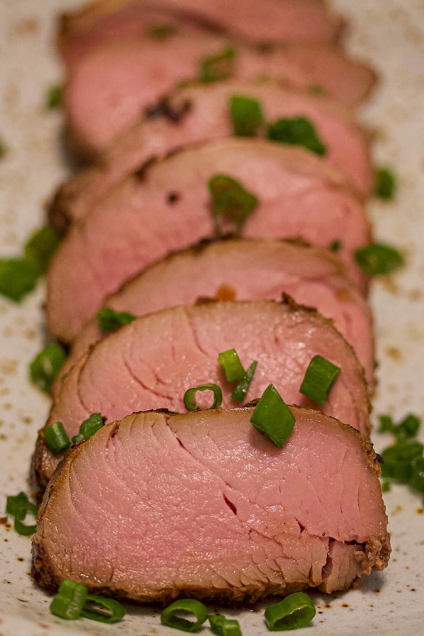 sous vide marinated pork tenderloin sliced medium rare