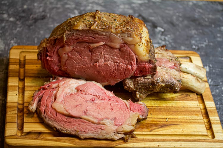 sous vide prime rib roast with herbed butter compound sliced