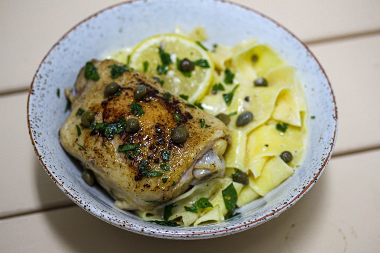 Sous Vide chicken thigh piccata on lemon pasta capers