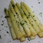 sous vide white asparagus with flake salt and parsley