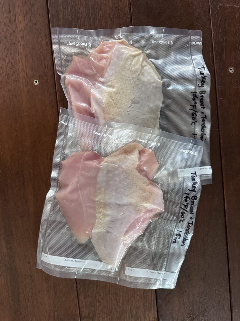 Vacuum sealed turkey breasts and tenderloins labeled 140F / 60C